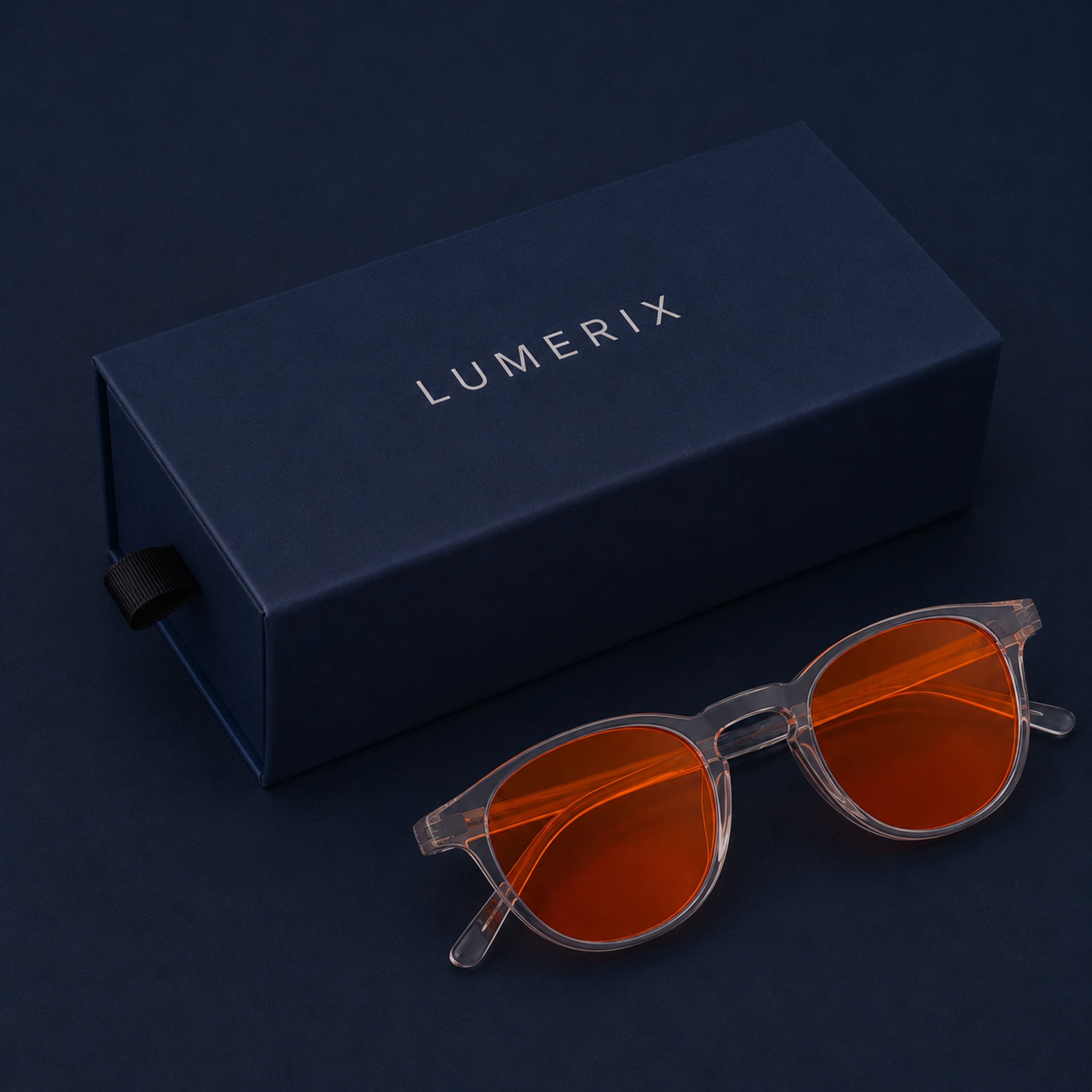 EVENING RITUAL Blaulichtfilterbrille in Crystal Clear neben der LUMERIX Box